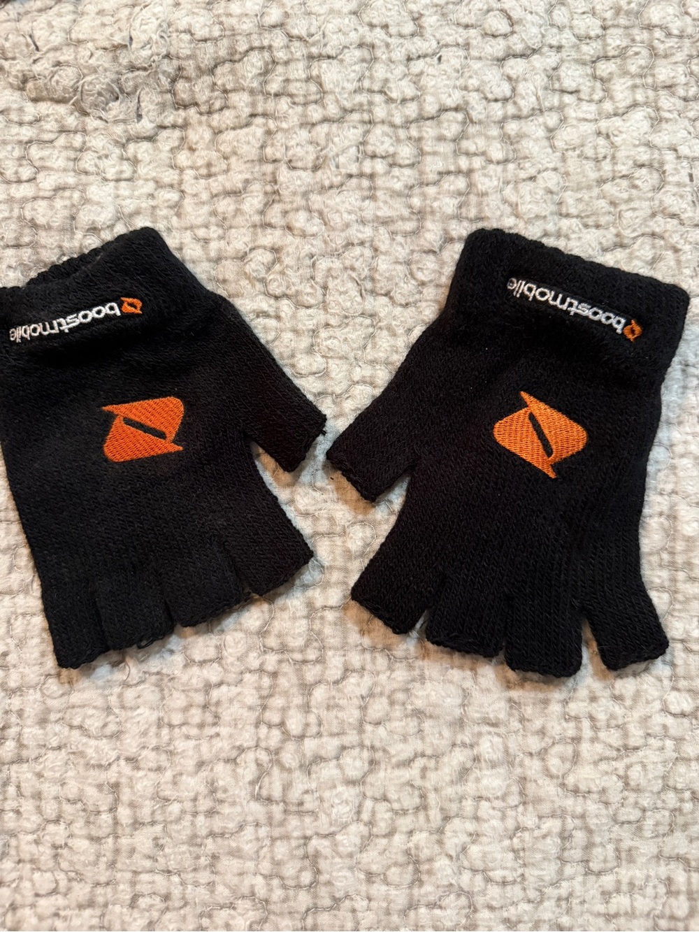 Black Fingerless Tech Gloves with Orange Logo